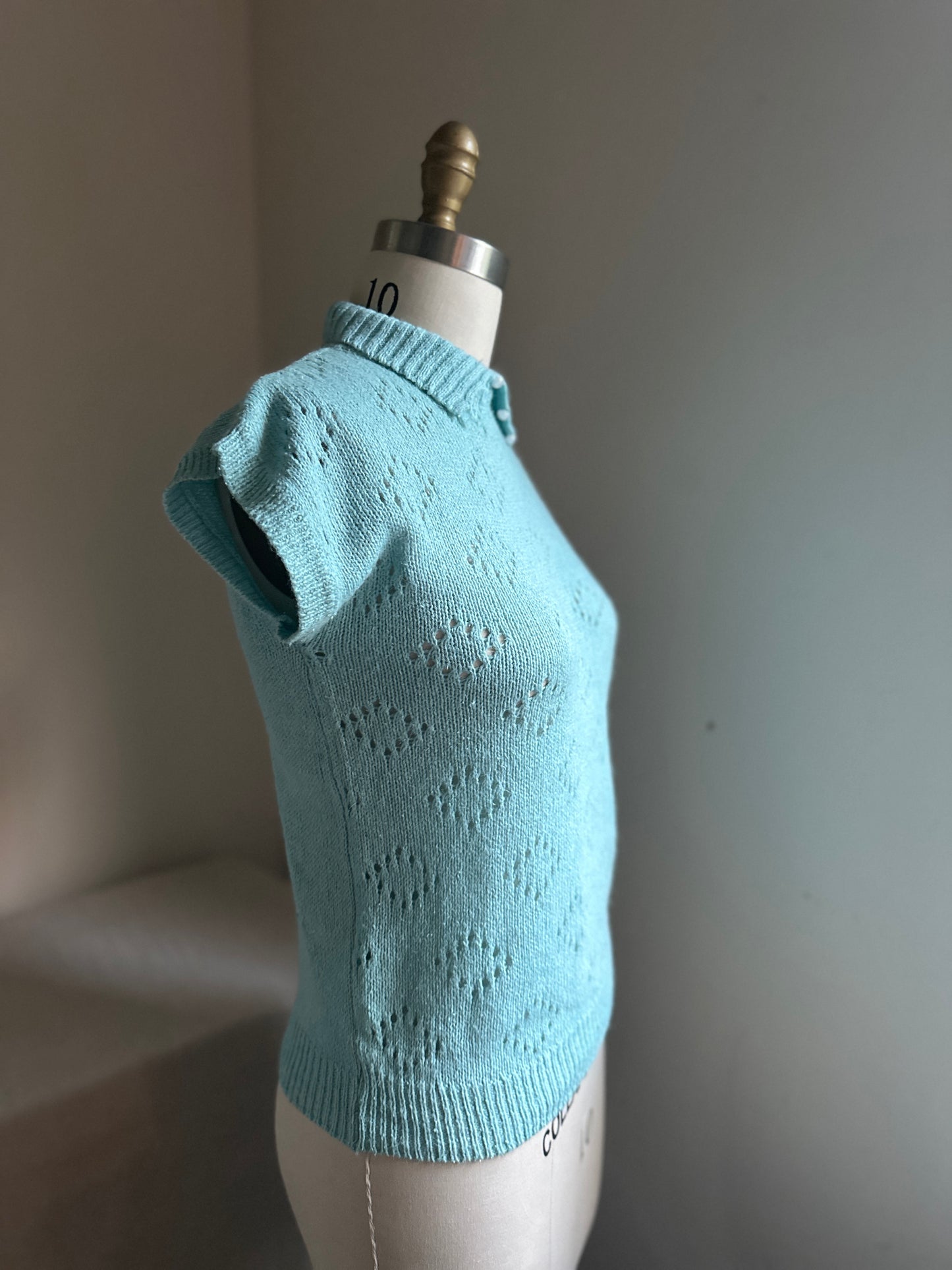 Spinning Tops Turquoise Sleeveless Sweater