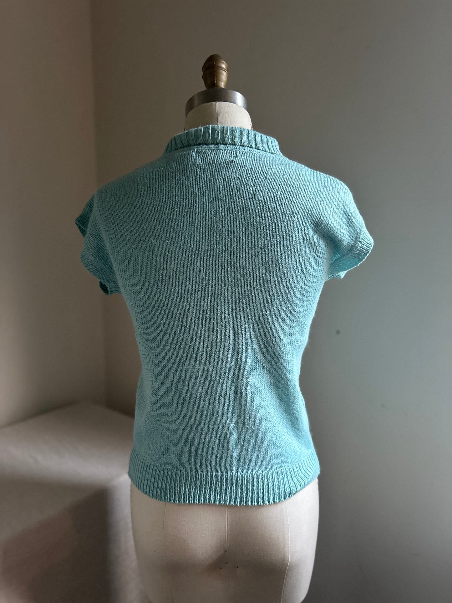 Spinning Tops Turquoise Sleeveless Sweater