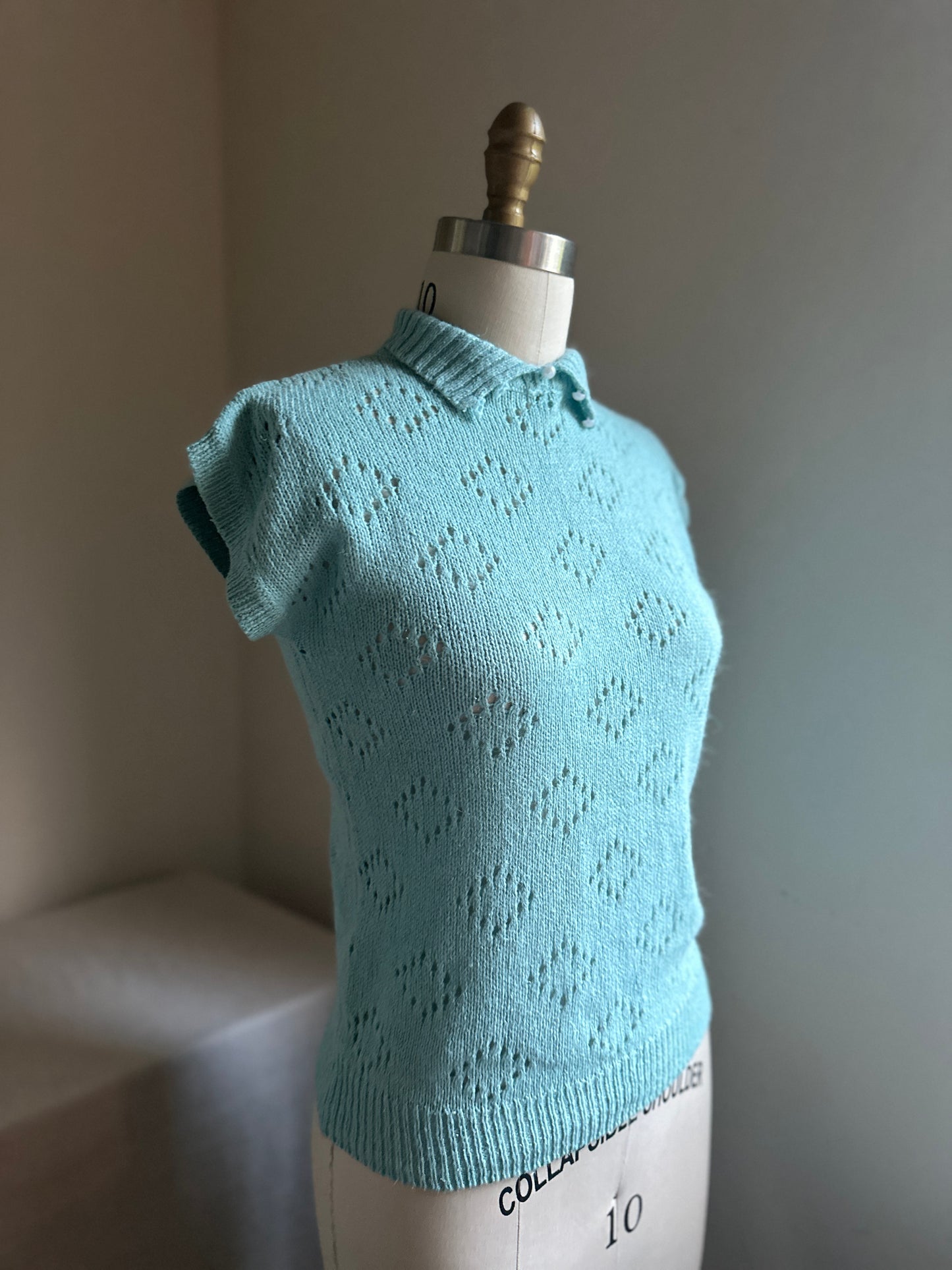 Spinning Tops Turquoise Sleeveless Sweater