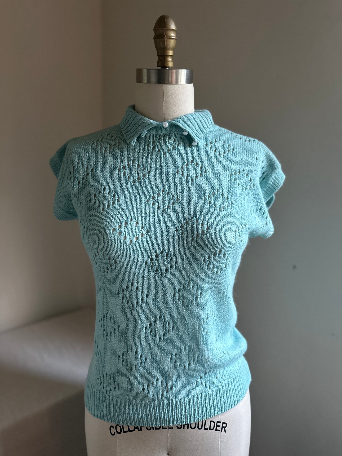 Spinning Tops Turquoise Sleeveless Sweater